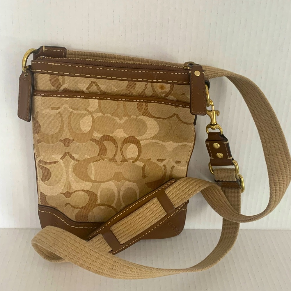 Coach women’s tan logo crossbody purse